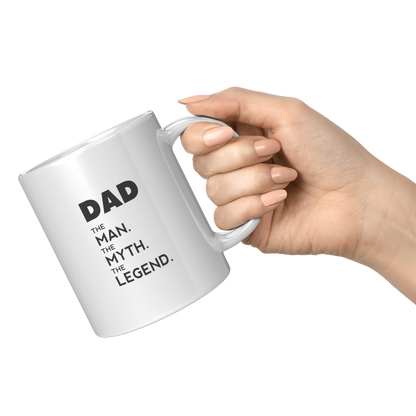 Dad_The_Man_The_Myth_The_Legend_Mug_11oz_White_RH_Model_Mockup.png