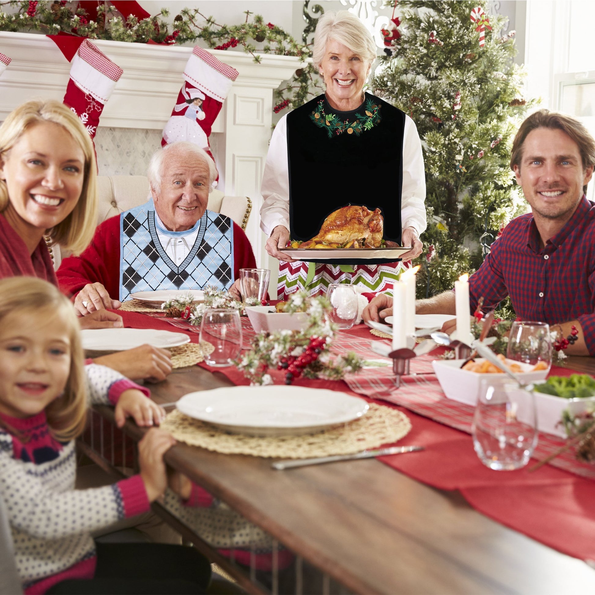 Family Enjoying dinner with our LIMITED EDITION Dress 'n Dine™ Winter Adult Bib